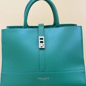 TEDDY BLAKE POCKETBOOK, GREEN LEATHER W/ GOLD ACCENTS AND SUEDE INTERIOR